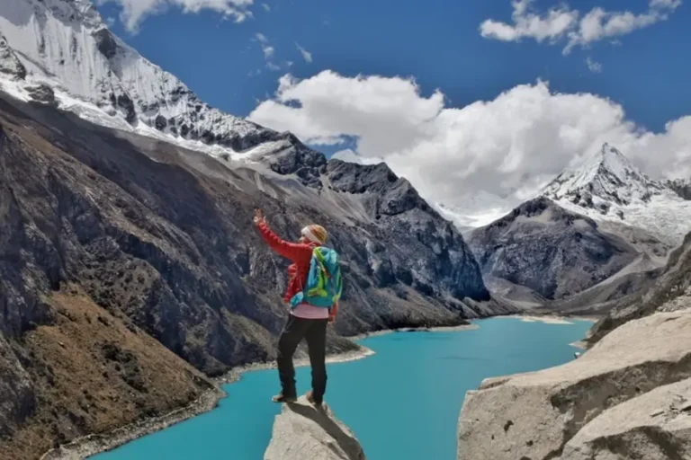 Huayhuash Trek 5 Days with turquoise lagoon and snow-capped mountains in Peru