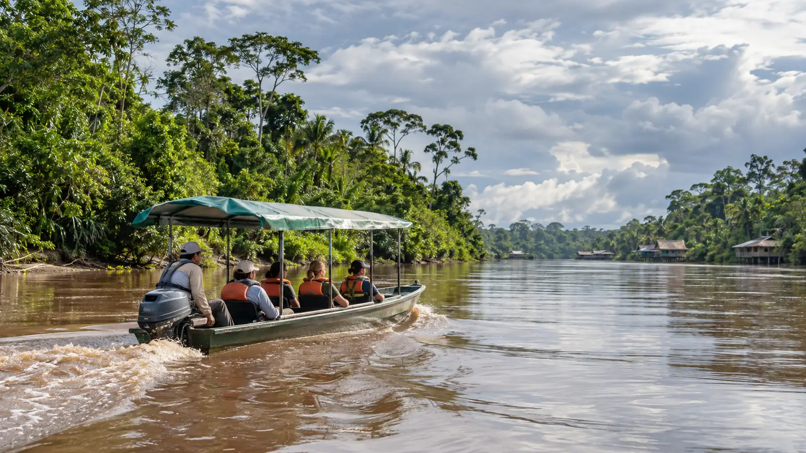 Covered motor canoe carrying travelers toward a jungle lodge on an Amazon tributary near Iquitos